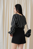 JODELL V-NECK RUFFLES TOP (BLACK)