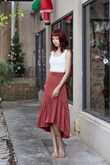 VALEN ASYMMETRICAL PLEAT SKIRT (BRICK)