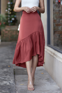 VALEN ASYMMETRICAL PLEAT SKIRT (BRICK)
