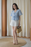 EVA SELF-TIE RIBBON BABYDOLL TOP (BABY BLUE) EVA SELF-TIE RIBBON BABYDOLL TOP (BABY BLUE)